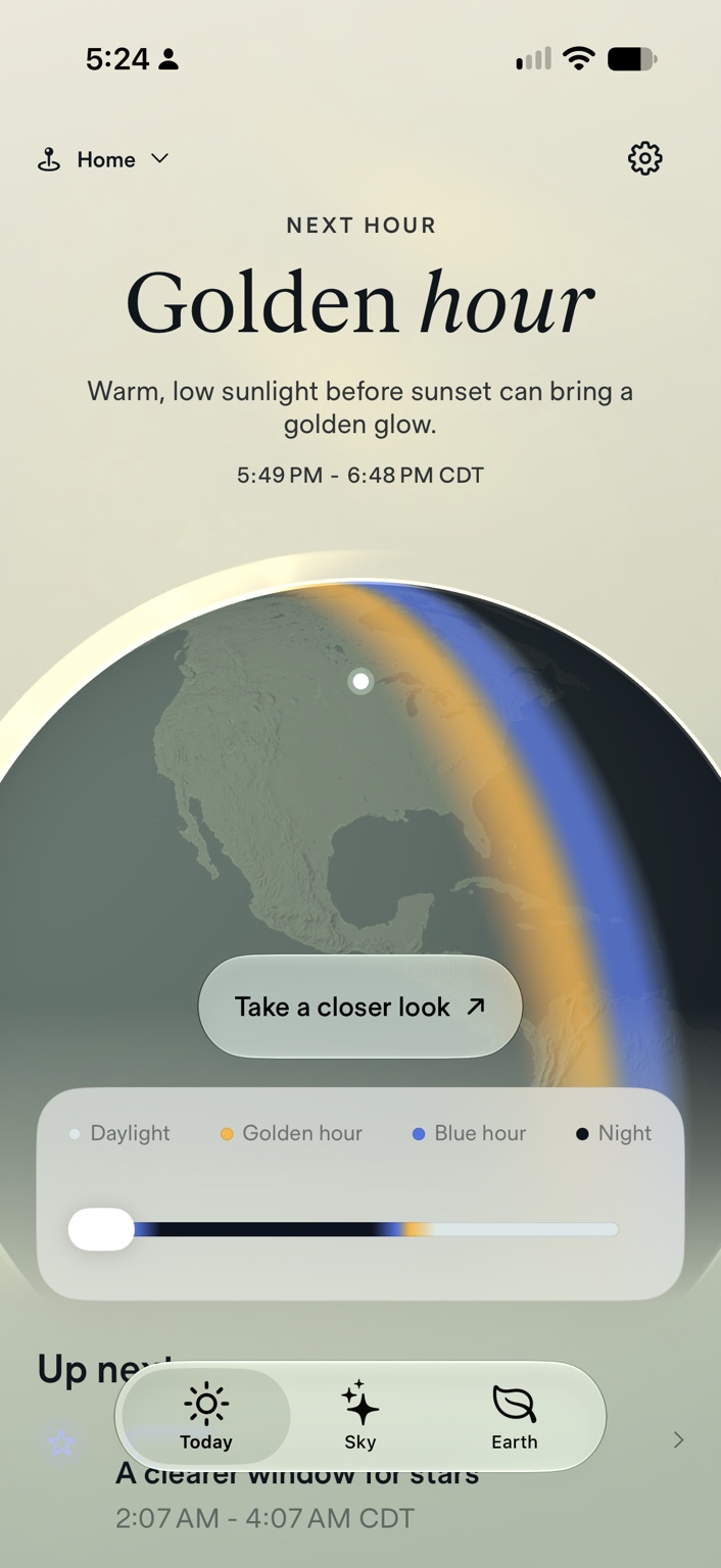Next Light’s golden-hour screen with local times, an interactive globe, and Today, Sky, and Earth tabs